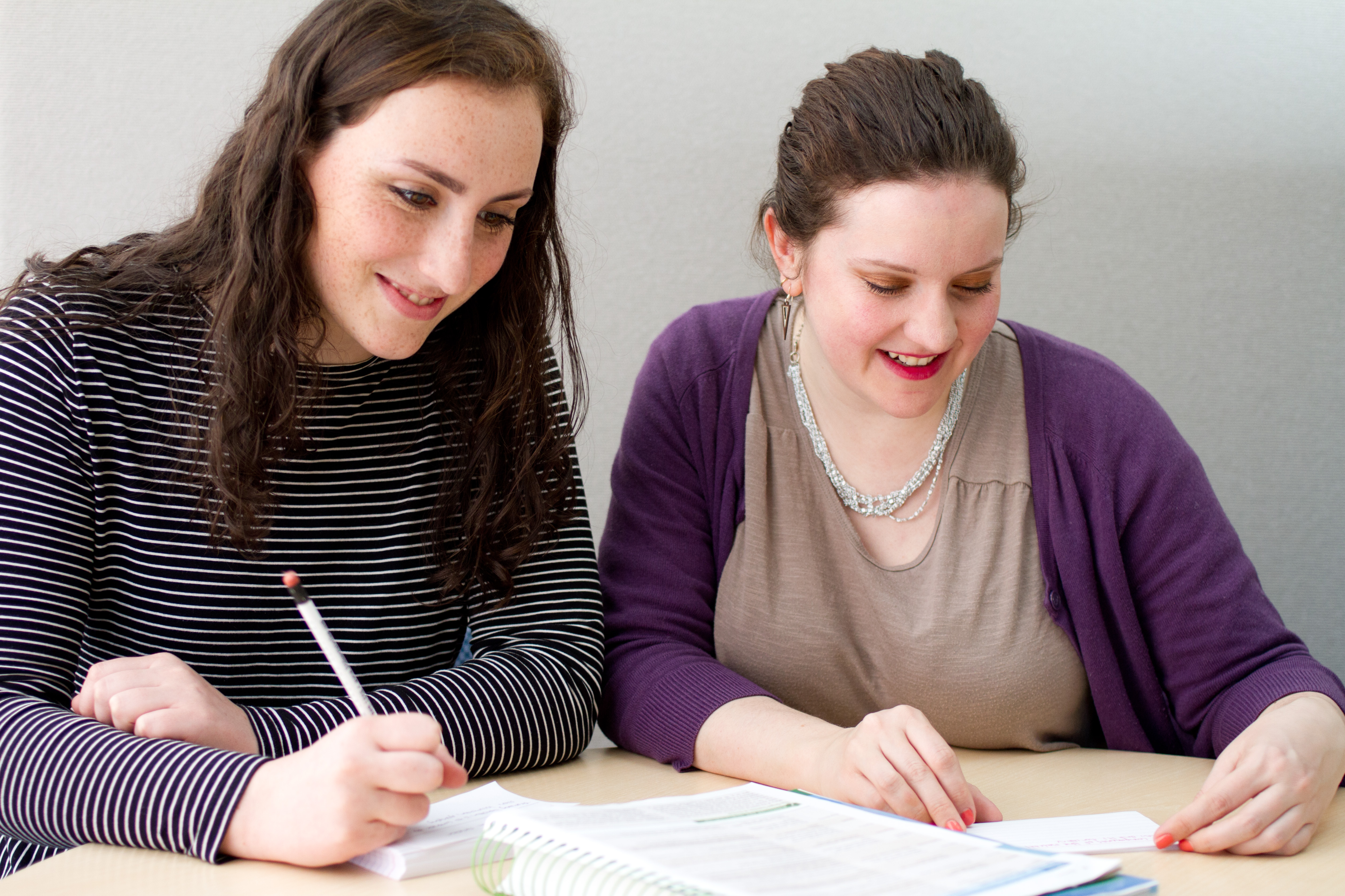 Monica and student work on studying together.
